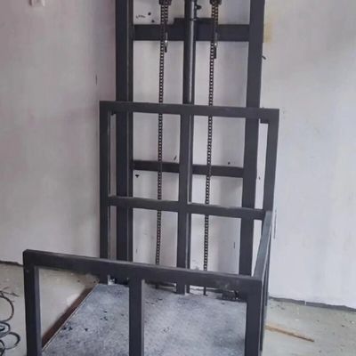 1-12M kaldırma yüksekliği çelik güç hidrolik yük asansörü PLC kontrolü